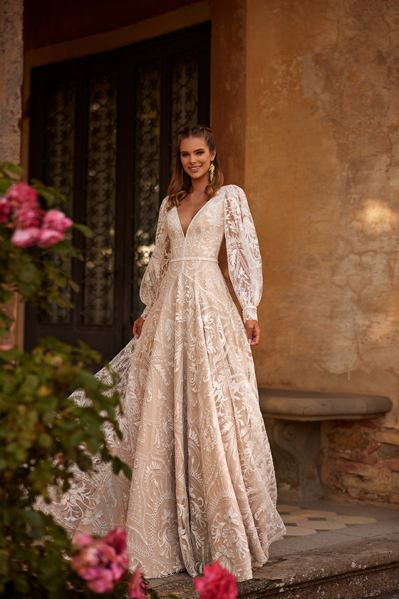 Abito da sposa boho a trapezio Noya in pizzo con maniche di DAMA Couture (dettaglio)