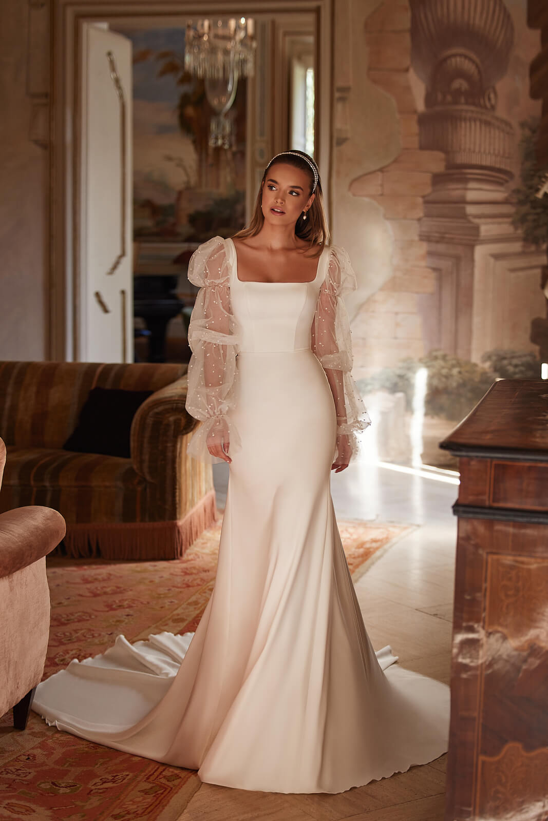 Abito da sposa Clara – abito da sposa a sirena con maniche lunghe, DAMA Couture.