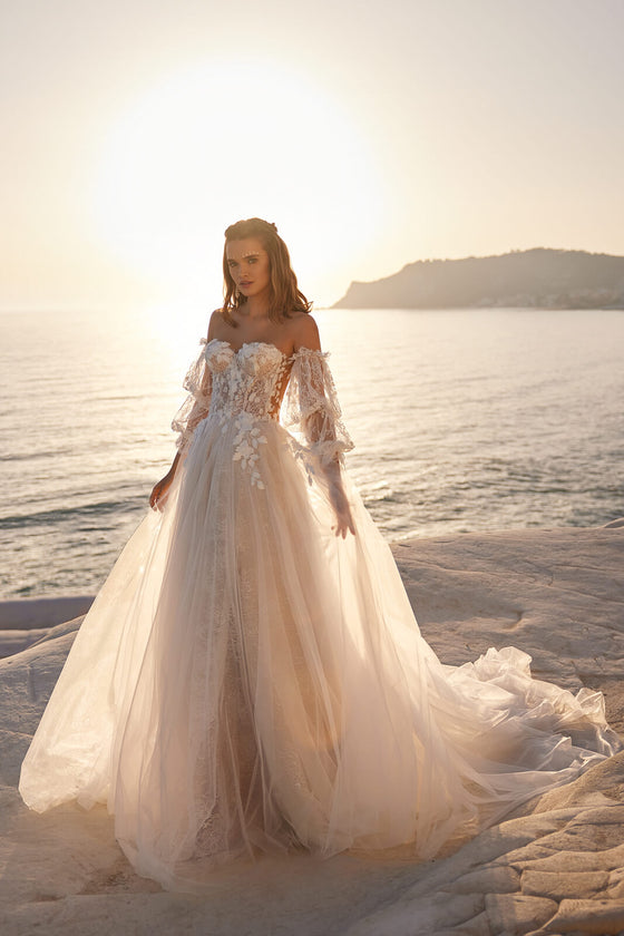 Abito romantico e autentico DAMA Couture, espressione di forza personale.