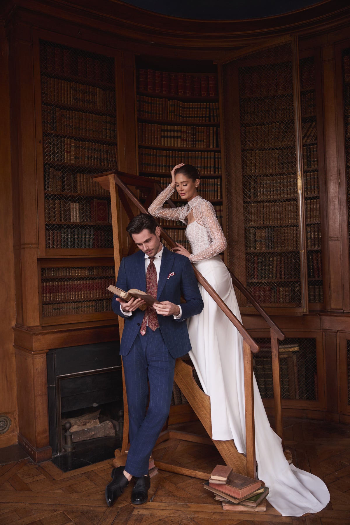 Abito da sposa Greta – abito da sposa a sirena con un corsetto senza spalline riccamente decorato di perline e una gonna drappeggiata in raso.