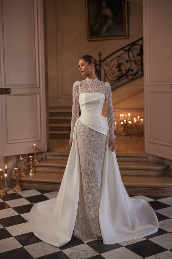 Sopragonna Juniona: sopragonna staccabile indossata sopra l’abito da sposa Juniona.